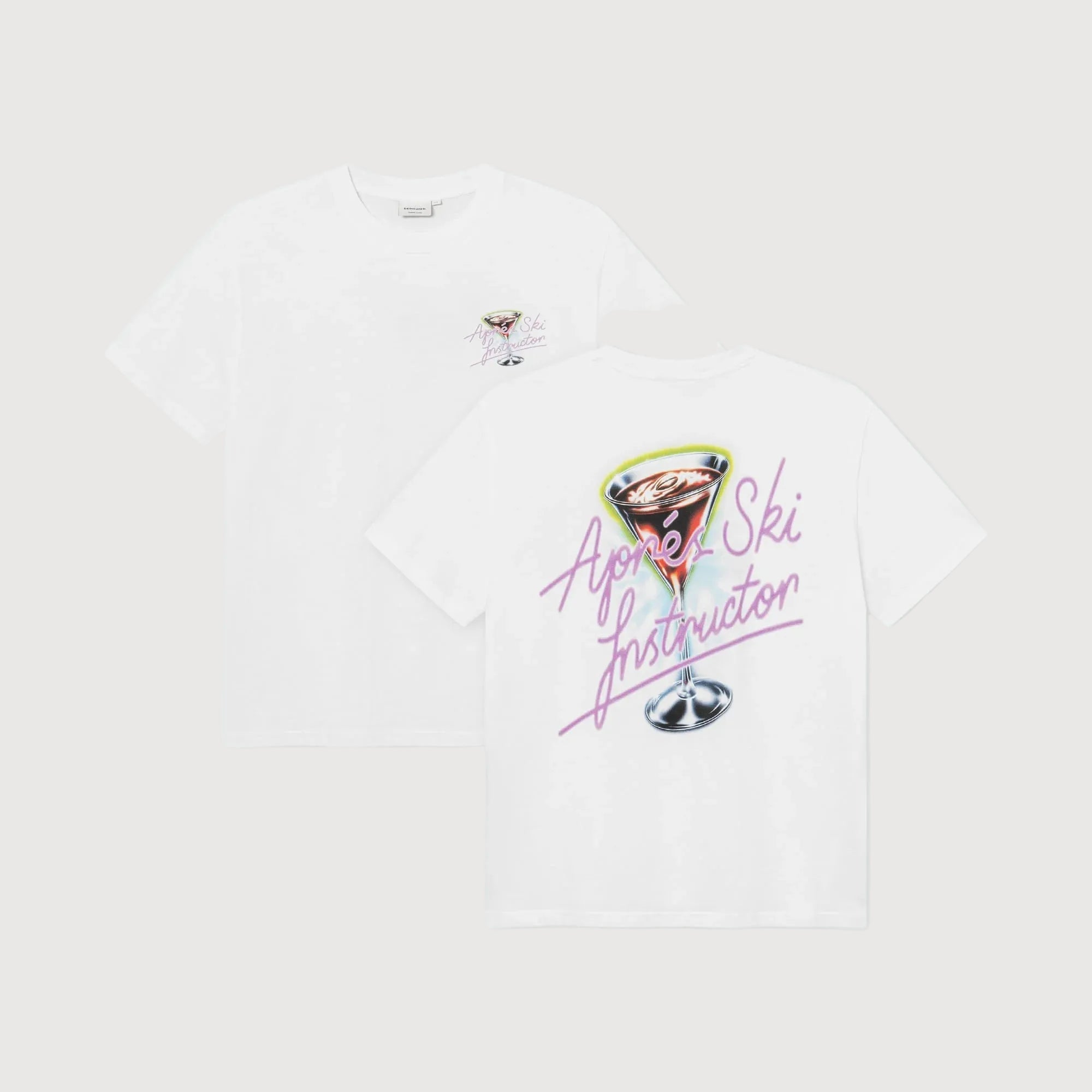 Two white short-sleeve T-shirts shown on a light gray background, displaying the front and back. The front features a small pink graphic on the left chest, while the back displays a larger graphic of a martini glass with the text 'Agnes Ski Instructor' in pink script.