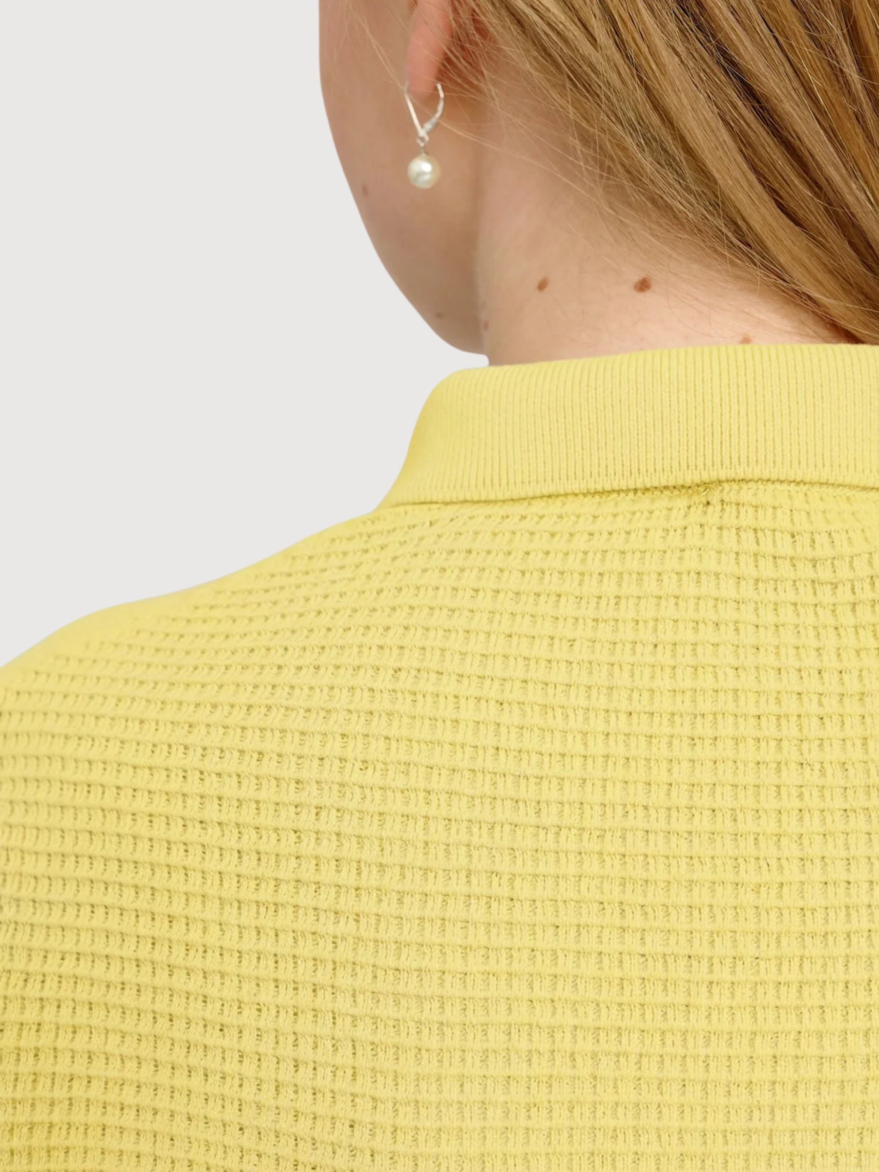Polo da donna in maglia di cotone giallo pastello | Mazine