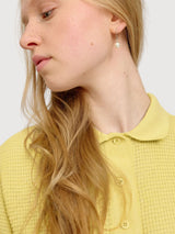 Polo da donna in maglia di cotone giallo pastello | Mazine