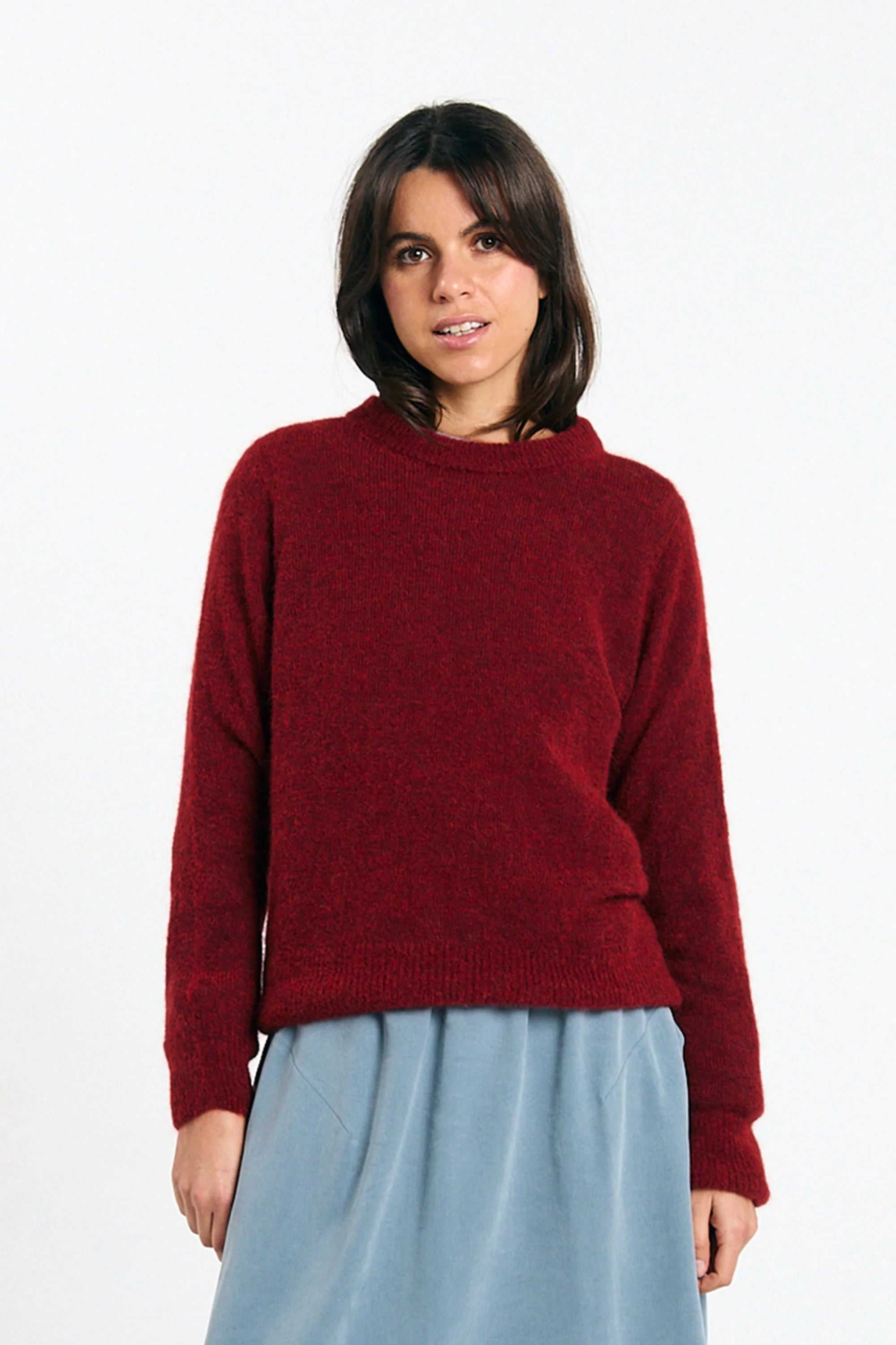SUITE13LAB Babol Jumper Brick sweater in vibrant red with a textured knit pattern, displayed flat showing front view.