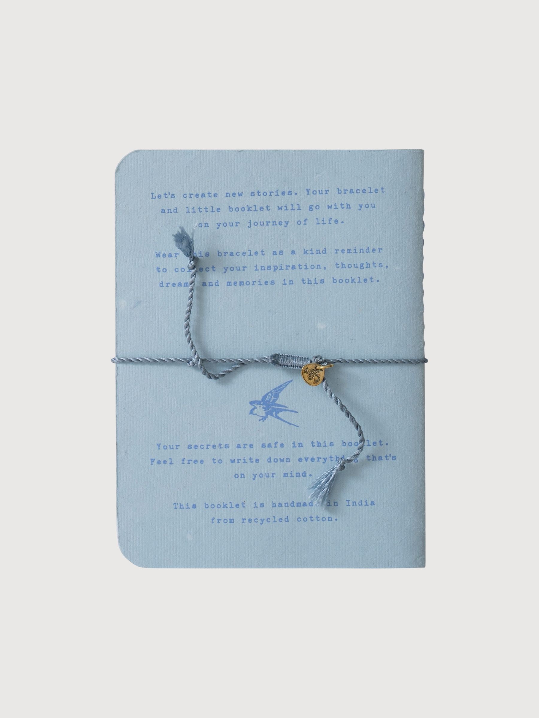 Libro di fiabe "amicizia" azzurro con gioiello i a be