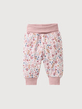 Pink reversible pants with autumn flowers | People Wear Organic