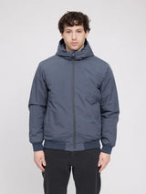 MAZINE padded Night Flight men's jacket with quilted design, standing collar, and zipper closure, displayed in a natural pose.