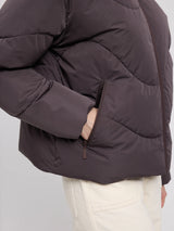 MAZINE Waves Quilt Short Puffer Jacket in eggplant color, showing a lightweight, quilted puffer design with a high collar and slim fit.