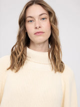 MAZINE chunky knit turtle neck pullover in Tofu color, featuring a cozy turtleneck and thick knit texture for warmth.