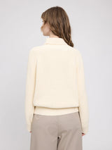 MAZINE chunky knit pullover with turtleneck in tofu color, featuring a cozy, textured design and ribbed cuffs.
