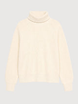 MAZINE chunky knit pullover with turtle neck in tofu color, featuring thick textured fabric and cozy design.