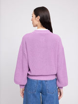 Pink grape cotton crew neck cardigan pullover by MAZINE, showing the knit texture and relaxed fit on a hanger.
