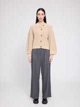 Light beige cotton crew neck cardigan pullover by MAZINE, showing a close-up of the knit fabric and classic crew neckline.