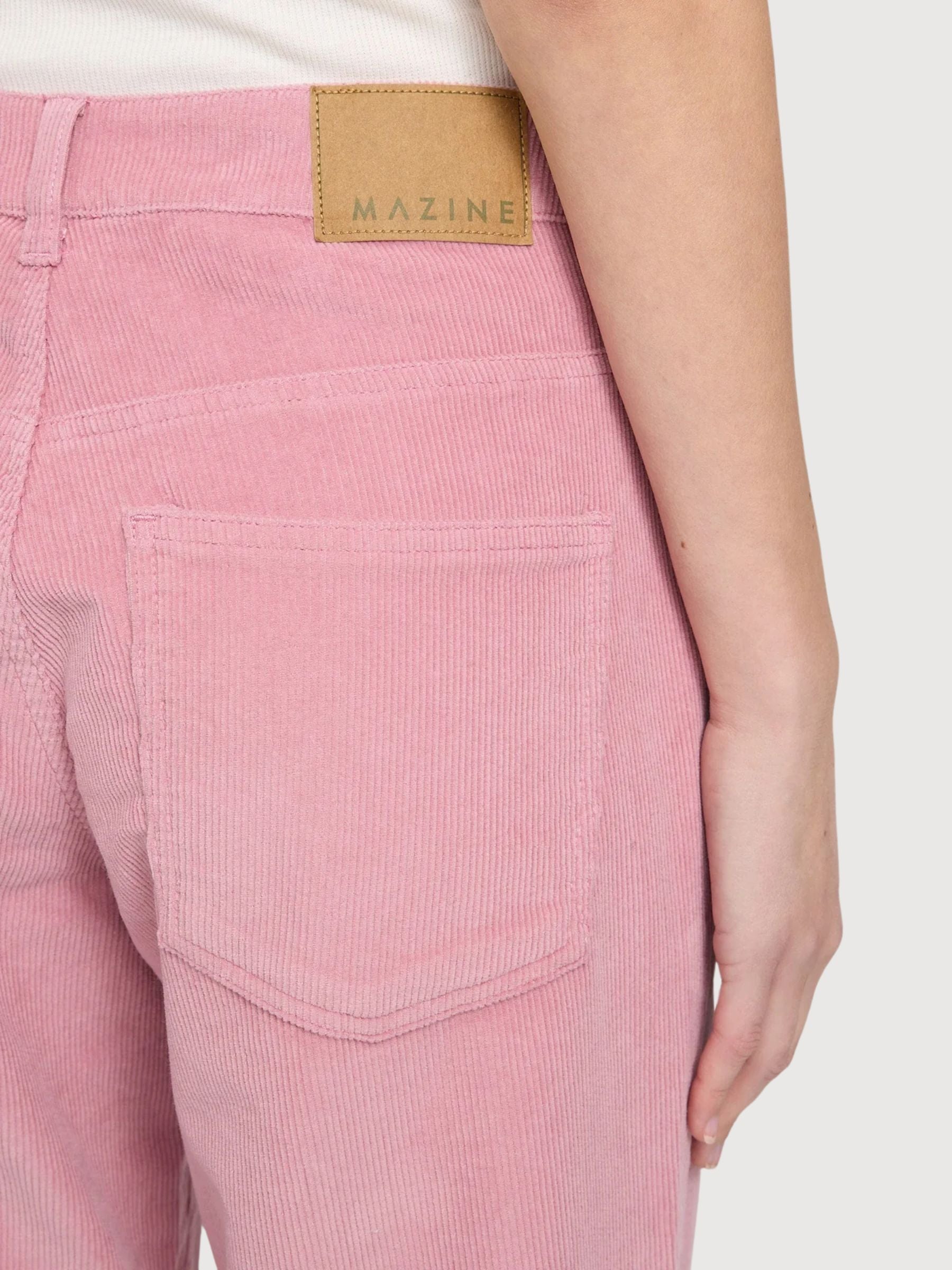 Pantaloni da donna a gamba larga in velluto a coste rosa cipria | Rivista