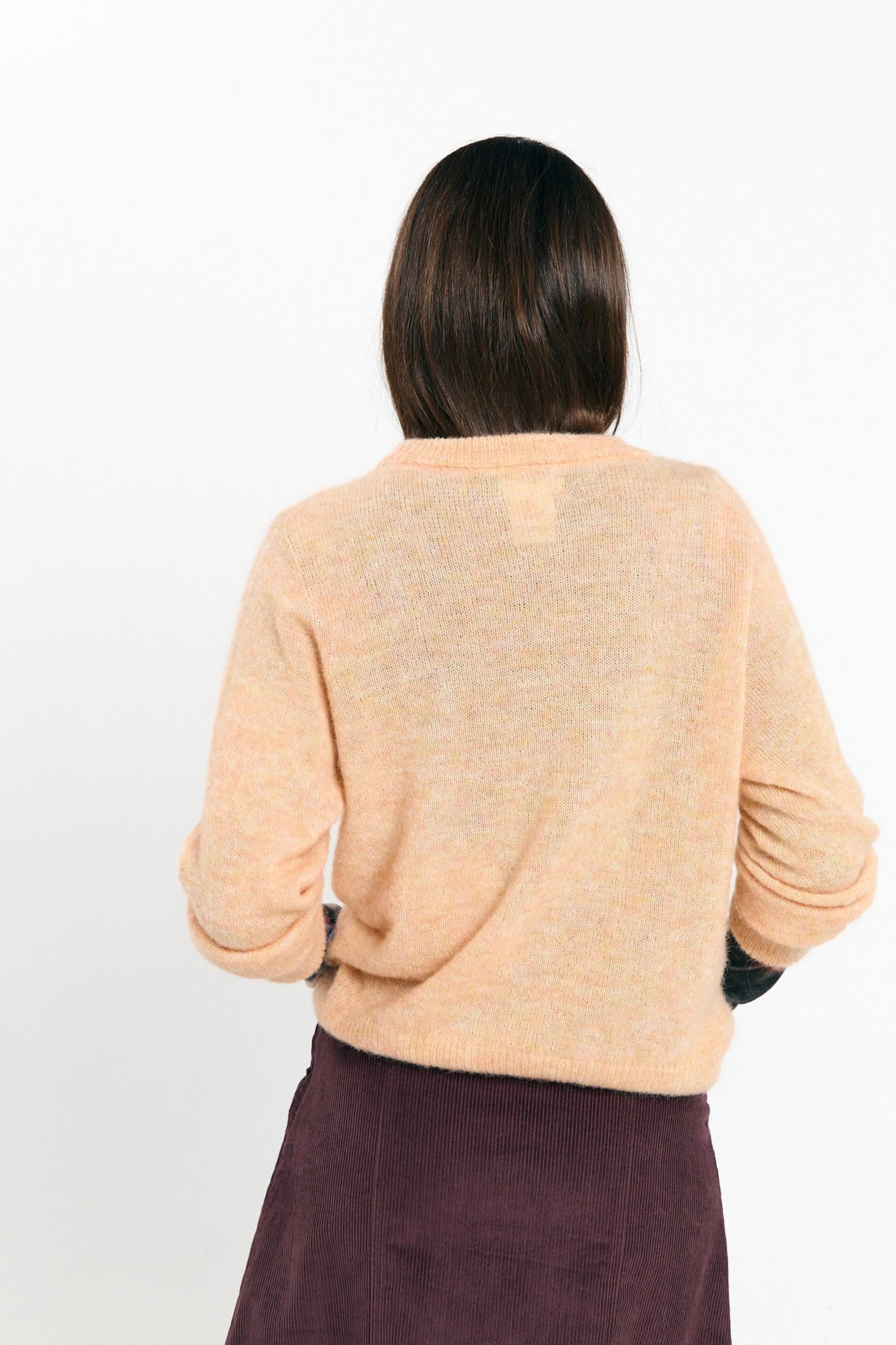 Light peach Babol Jumper sweater by SUITE13LAB, featuring a cozy knit texture and fitted design on a neutral background.
