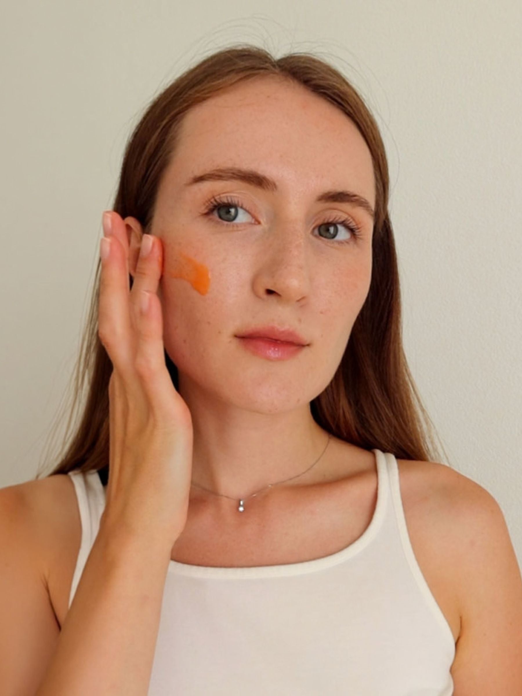 Brightening Vitamin C Serum by TEAM DR JOSEPH in a 30 ml bottle, shown with its sleek packaging and clear serum inside.