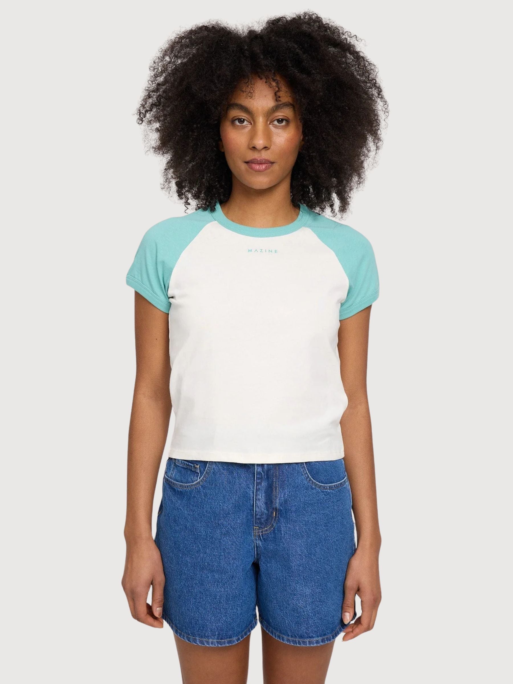 T-shirt con maniche a contrasto turchese/bianco | Rivista