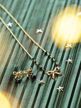 Earring Ribbon Black Onyx Gold | A Beautiful Story