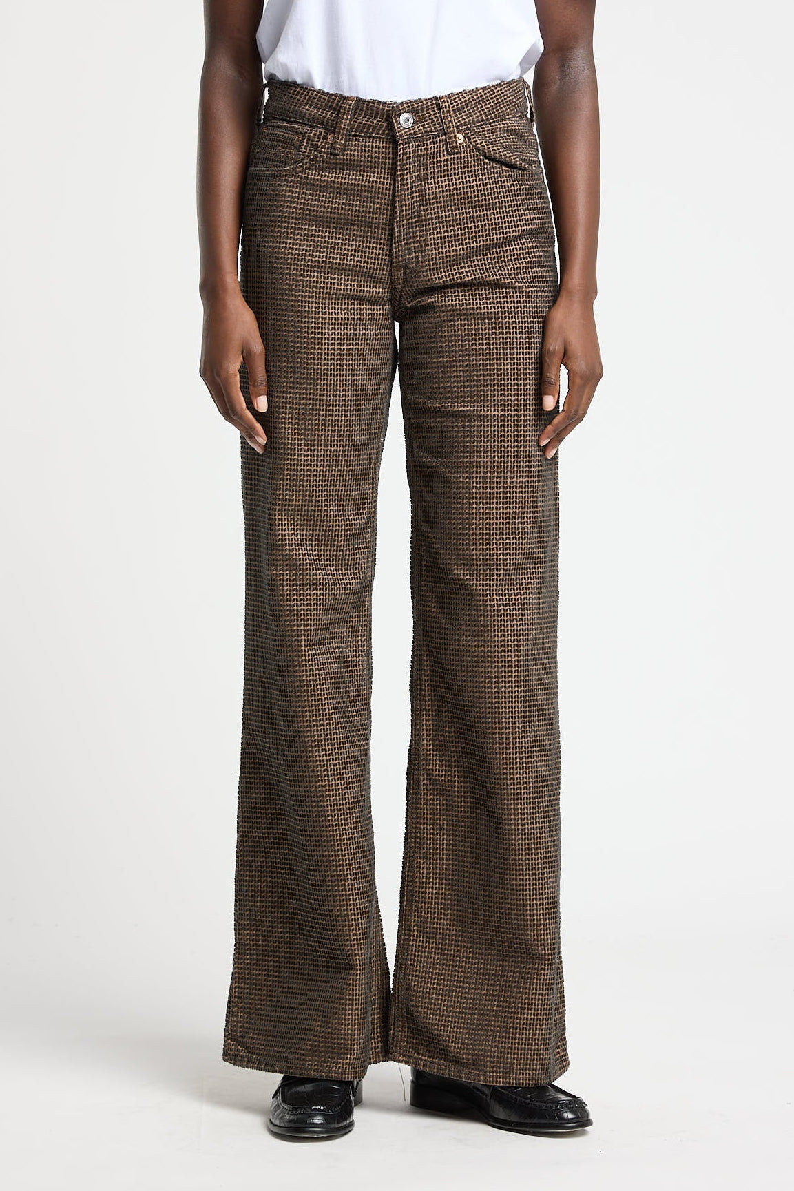 Brown Jane Dewintery trousers by Kings of Indigo, featuring corduroy fabric and a tailored fit, shown on a model.
