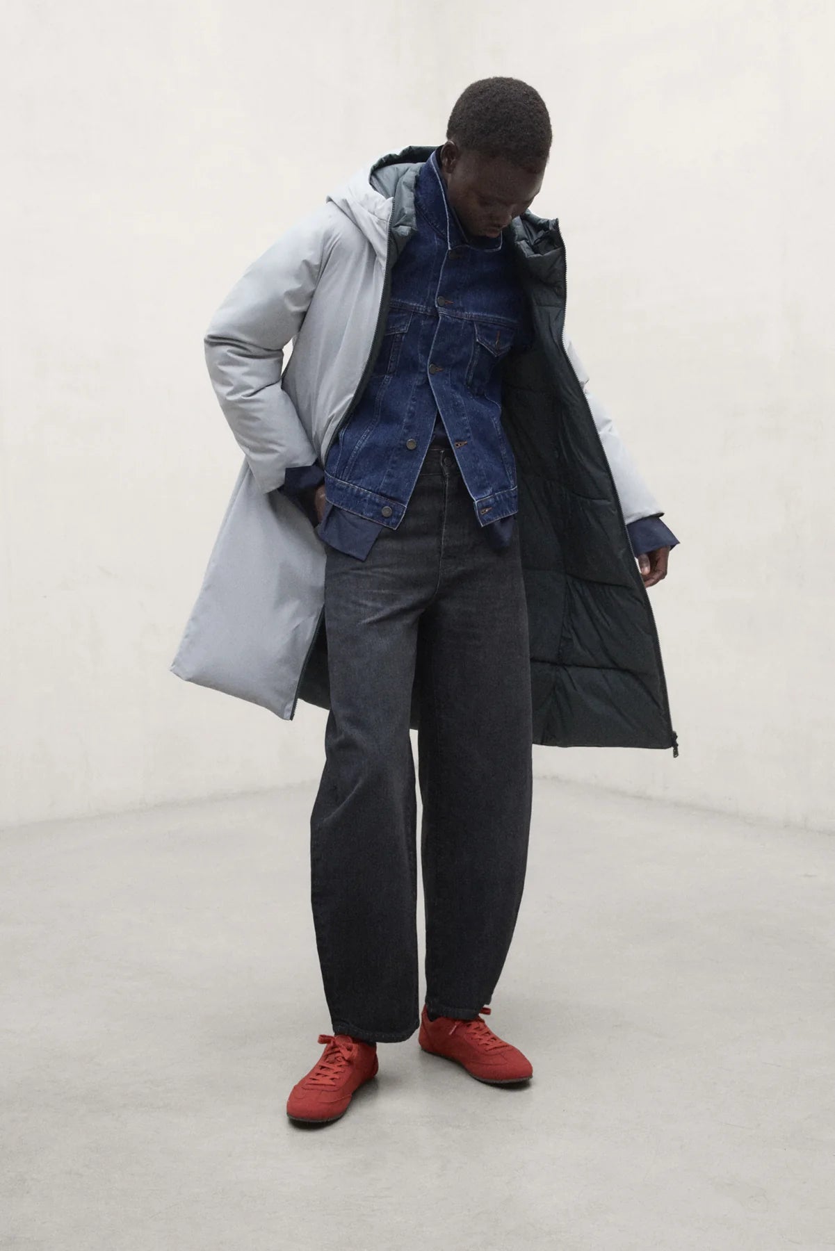 ECOALF Baru women's blue pearl jacket with a stylish design and front zipper, displayed on a hanger.
