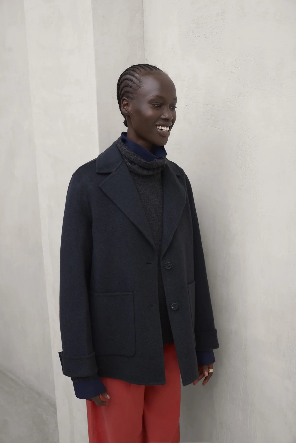 Dana women's charcoal khaki jacket by ECOALF, featuring a stylish, lightweight outdoor design with a zip front and hood.