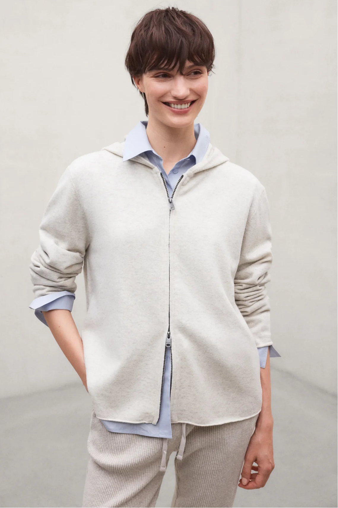 ECOALF Abril women's sweater in bone melange knit, featuring a cozy, fitted design with long sleeves and ribbed cuffs.