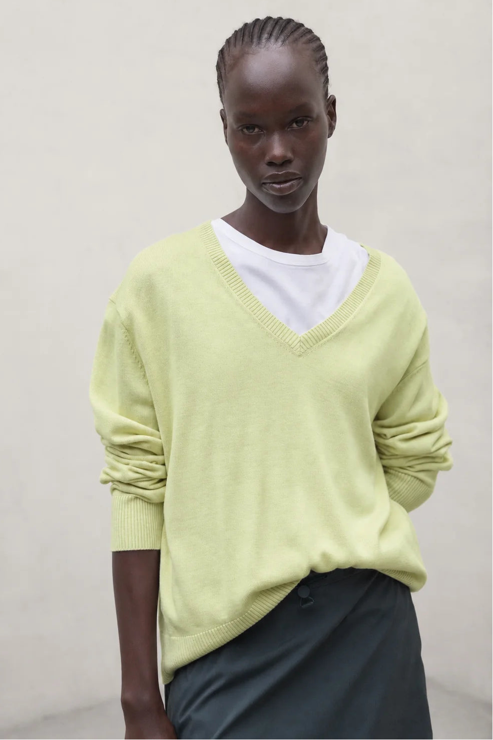ECOALF Aroa women's soft lime sweater with long sleeves and ribbed cuffs, lightweight and cozy for casual wear.