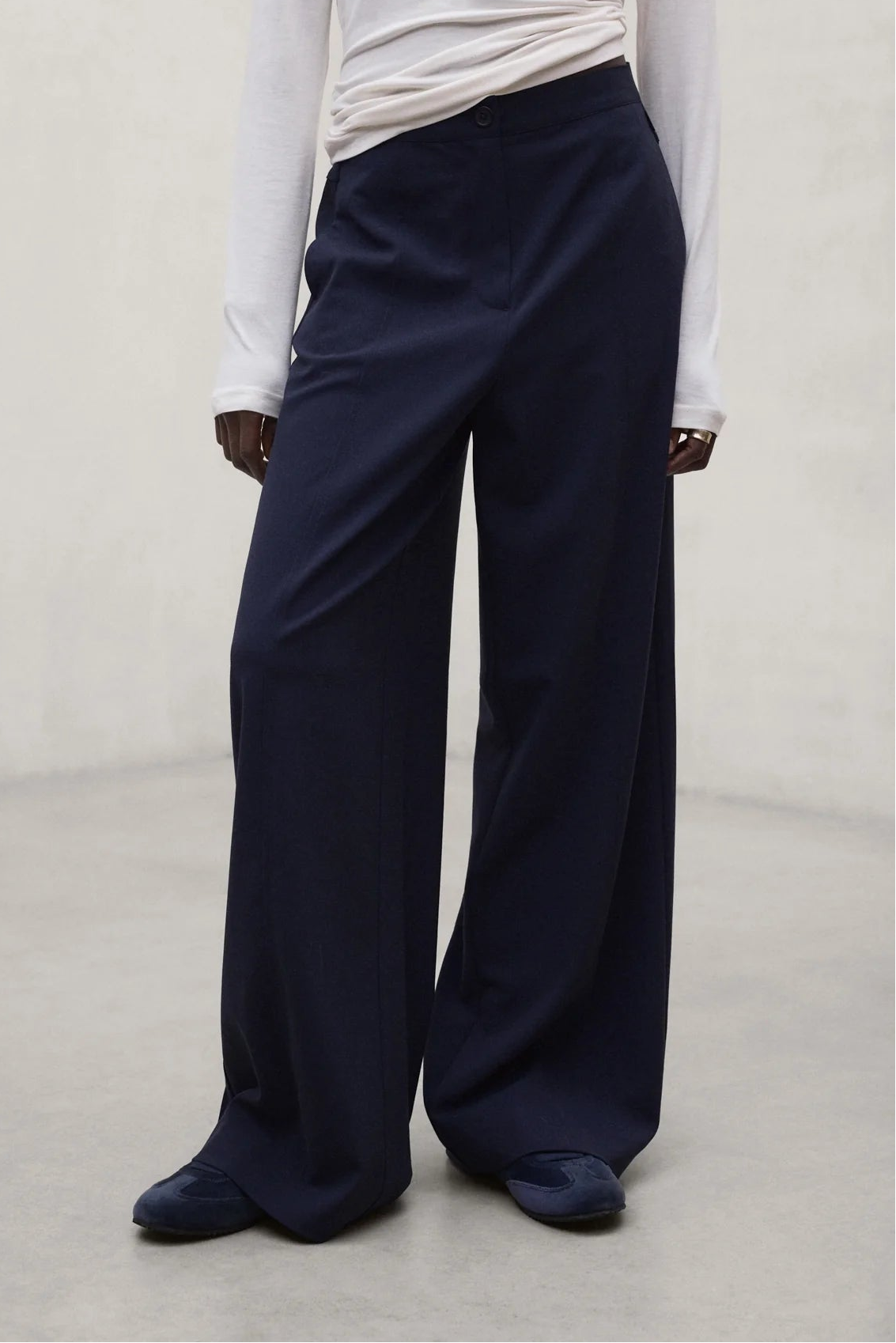 Sierra women's cotton trousers in deep navy by ECOALF, shown flat with waistband and pockets visible.
