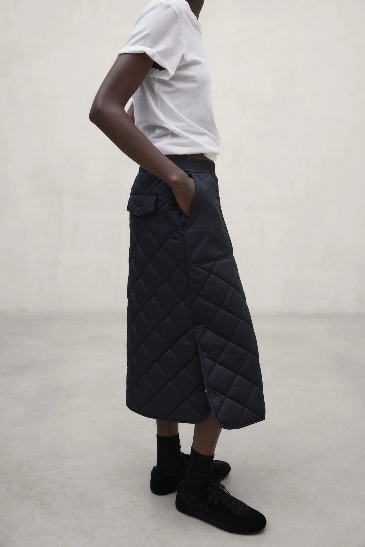 Nubi women's navy and black skirt by ECOALF, featuring a stylish design with a comfortable fit and eco-friendly fabric.
