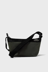 Black shoulder bag on a light gray background