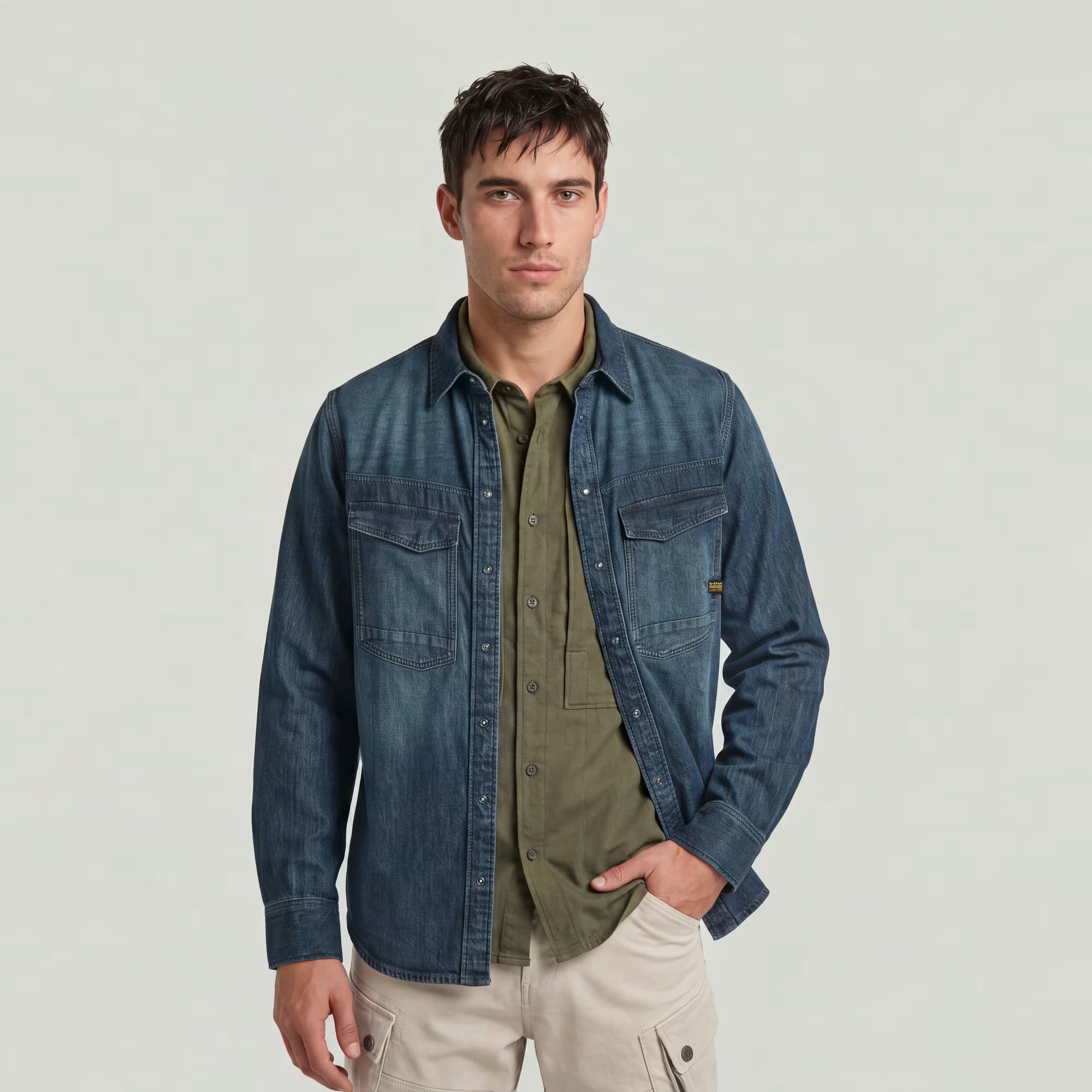 Dark blue G-Star Raw Dakota Regular Shirt displayed flat, showcasing its classic fit and button-down style.