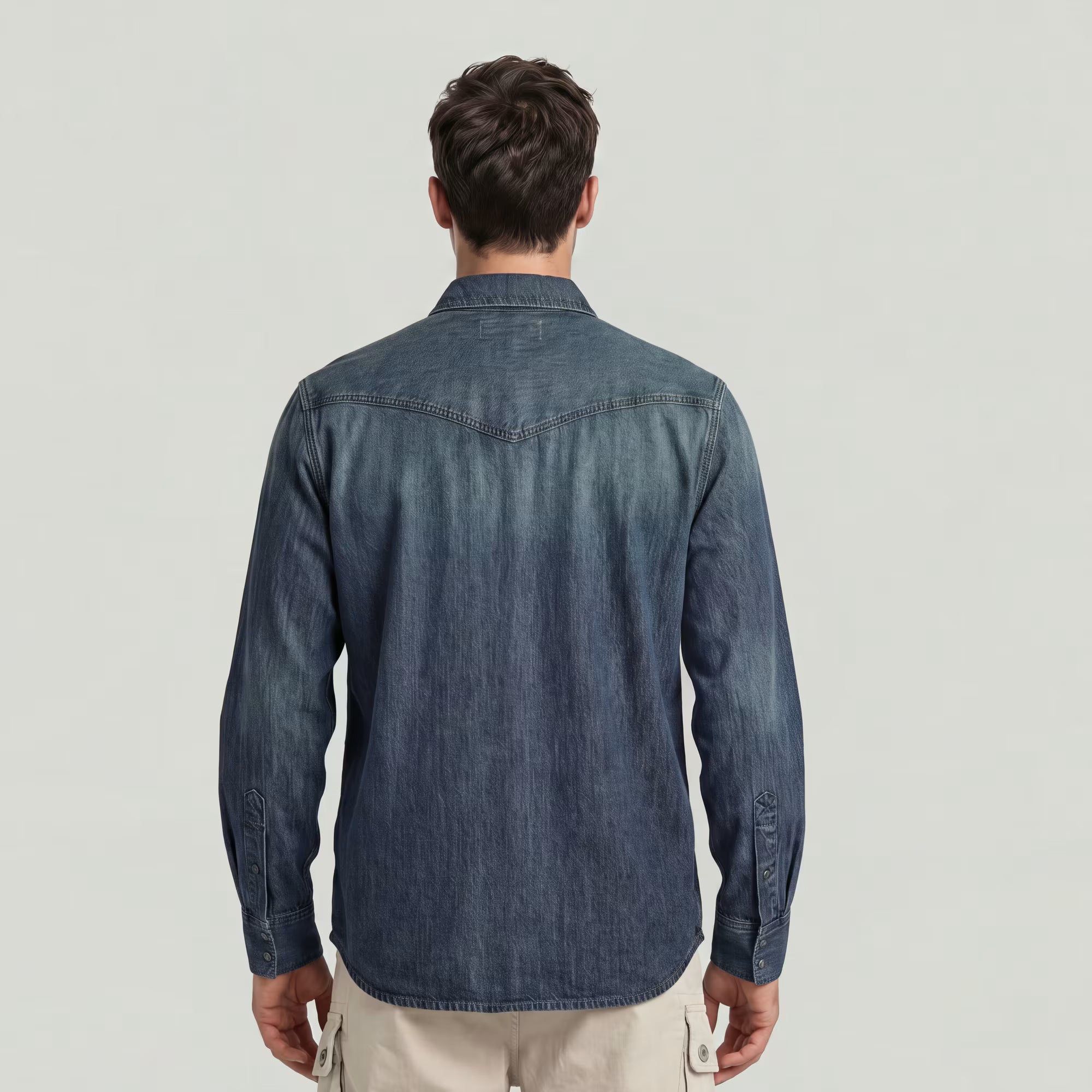 Dark blue G-Star Raw Dakota Regular Shirt displayed on a hanger, featuring a classic fit with button front and collar.