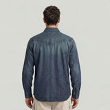 Dark blue G-Star Raw Dakota Regular Shirt displayed on a hanger, featuring a classic fit with button front and collar.