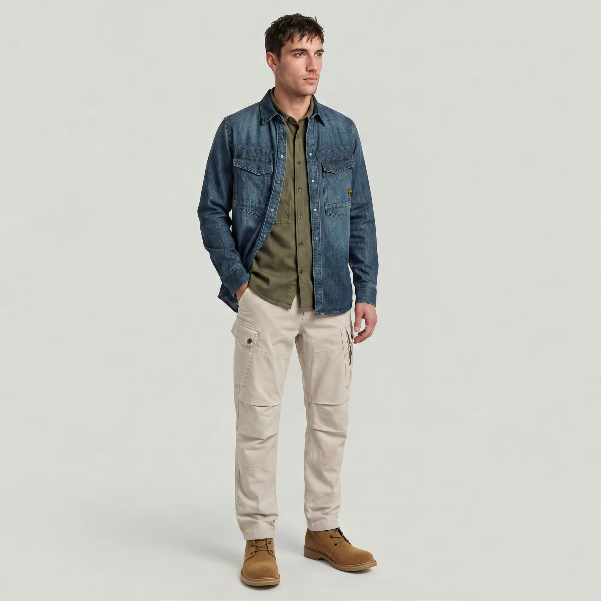 Dark blue G-Star Raw Dakota Regular Shirt displayed on a hanger, featuring a classic collar and button front.
