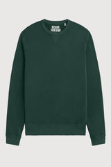 A dark green crewneck sweatshirt with a white graphic text print on the inside of the collar reading 'BECAUSE THERE IS NO', displayed flat against a light gray background.
