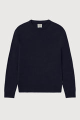 A dark navy blue crewneck sweater displayed flat against a light gray background.